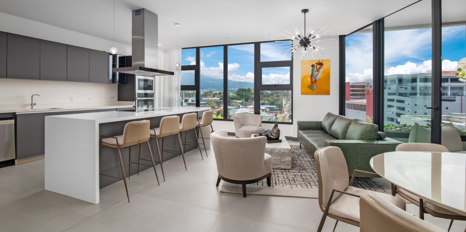 DEN 7 Model Penthouse living room and kitchen