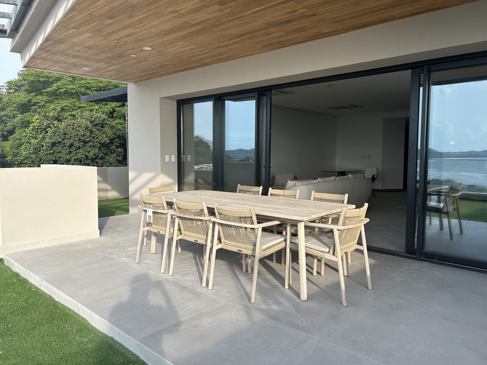 Outdoor dining table with chairs on the terrace